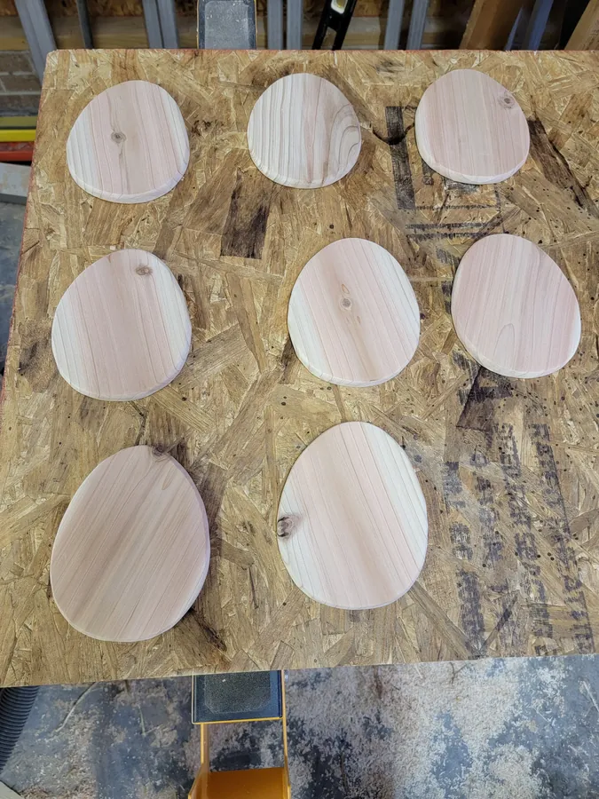 Round wooden components cut and prepared for a custom project